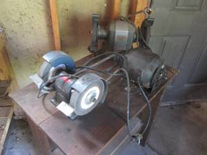 lot 39 image: Pair if electric grinders with table