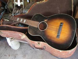 lot 28 image: Vintage Bronson guitar in a semi-hard side alligator style case