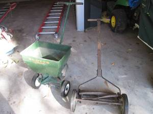 lot 238 image: Vintage reel mower and lawn spreader