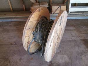 lot 246 image: Partial spool of heavy grade electrical cable