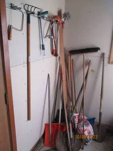 lot 409 image: Corner lot of lawn, garden and snow...