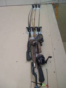lot 477 image: Another lot of 7 fishing rods and r...