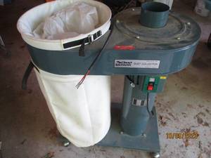 lot 502 image: Portable Reliant 115v electric dust...