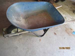 lot 505 image: Large metal bucket wheelbarrow with...