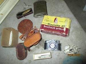 lot 520 image: Vintage shotgun shells and unique a...