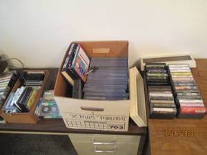 lot 312 image: Filebox containing a large assortment of tapes and reading materials