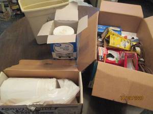 lot 315 image: Box of household lightbulbs, trash bags, etc
