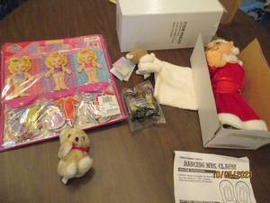 lot 319 image: Teeny-Tiny magnetic wood dress up doll set
