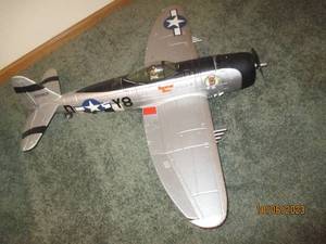 lot 333 image: Inflatable plastic and foam Navy airplane