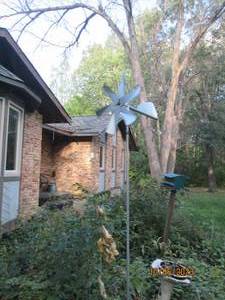 lot 405 image: Smaller metal windmill...