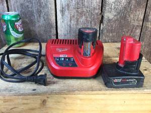 lot 70 image: Milwaukee M12 Charger - Batteries