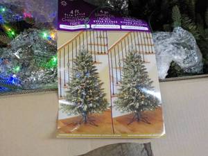 lot 28 image: 4 ft Slim Style Artificial Tree fro...