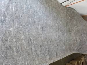 lot 39 image: 8 ft x 10 ft Rug Pad can be cut to...