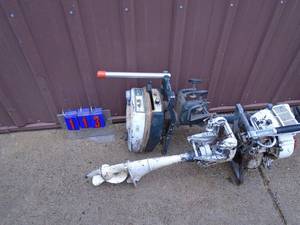 Qty of 2 vintage outboard motors. Both turn over. As shown.
