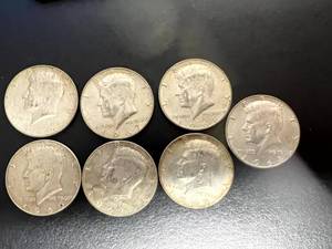 7 Kennedy Half Dollars 40% Silver