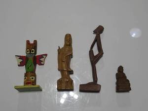 Lot of Four Wooden FigureinesStatues