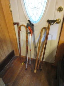 lot 141 image: GRABBERS AND DECORATED WOODEN CANES