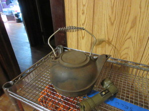 lot 147 image: CAST IRON POT AND FLASHLIGHT