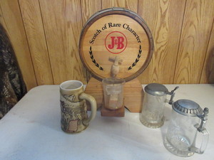 lot 161 image: VINTAGE J&B SCOTCH DISPLAY WITH PUMP AND NICE STEINS