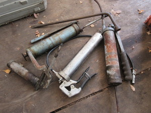 lot 197 image: GREASE GUNS AND TIRE IRON