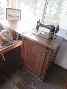 lot 237 image: FRANKLIN TREADLE SEWING MACHINE IN ORNATE CABINET