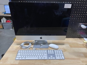 lot 24 image: Late 2013 Apple 21.5 Desktop Computer
