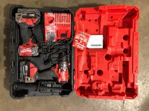 lot 4 image: Milwaukee M18 FUEL 18V Lithium-Ion Brushless Cordless Hammer Drill and Impact Driver Combo Kit (2-Tool) with 2 Batteries Customer Returns See Pictures