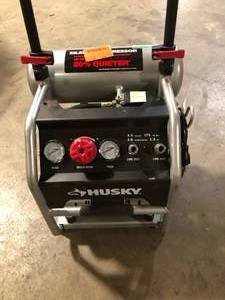 lot 5 image: Husky 4.5 Gal. Portable Electric-Powered Silent Air Compressor Customer Returns See Pictures