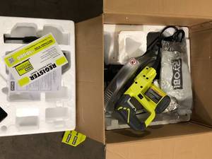 lot 28 image: RYOBI 14 Amp Corded 10 in. Compound Miter Saw with LED Cutline Indicator Customer Returns See Pictures