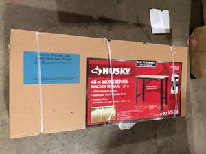 lot 45 image: Husky Ready-To-Assemble 4 ft. Solid Wood Top Workbench in Black   Customer Returns See Pictures
