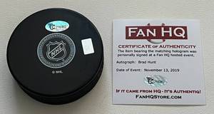 lot 310 image: Brad Hunt Signed Minnesota Wild Hockey Puck with Fan HQ COA