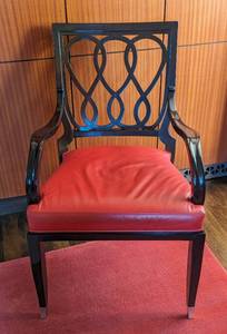 lot 142 image: Lucien Rollin for William Switzer Black and Red Leather Armchair