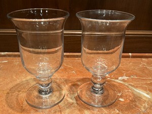 lot 153 image: Pair of Simon Pearce Footed Glass Candle Holders