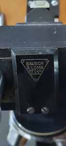lot 24 image: Bausch and Lomb Microscope. Made in the USA, Serial No. 273590 with Wooden Case