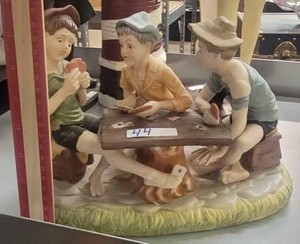 lot 44 image: A Curio of Three Boys Playing Cards, Two of them cheating at the game, the letter N on the bottom