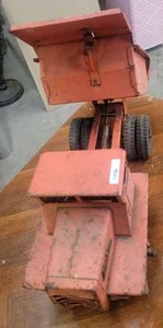 lot 106 image: Mack Dump Truck with Hydraulic Dump Sandbox Toy (Box does not always stay down)