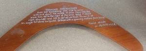 lot 170 image: Boomerang with instructions. Made in Australia