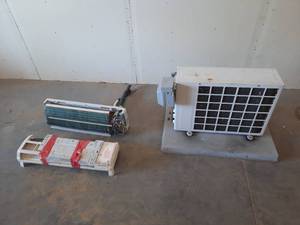 lot 8 image: Samsung Commercial wall mounted AC unit with outdoor condenser.