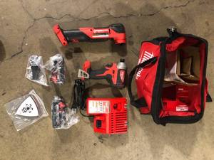 Milwaukee M18 FUEL 18V Lithium-Ion Brushless Cordless Multi-Tool Impact Driver Combo Kit (2-Tool) with 2 Batteries  Customer Returns See Picture