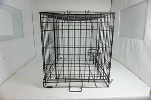 Black Wire Crate To Keep Animal Inside--Its Collapsible For Storage