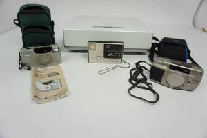Canon Sureshot PRIMA 60 Zoom Camera W Carrying Case & Booklet- Kodak Disc 4000 Camera-Minolta Supreme Camera WCarrying Case-Sony Model #VPL-CX85 Data Projector