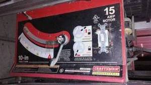 Craftsman 15 amp table saw on rolling stand. 10 blade.