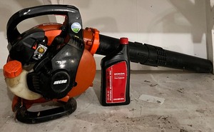 lot 72 image: ECHO Pb-251 Gas Leaf Blower and Can of Oil