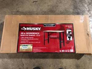 Ready-To-Assemble 4 ft. Solid Wood Top Workbench in Black by Husky   Customer Returns See Pictures