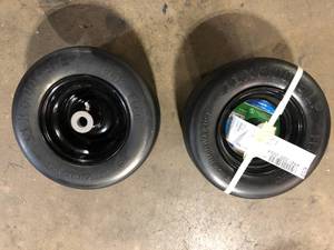 Lot of 2 Universal 11 in. x 6 in. Smooth Tread Black Rim Flat Free Wheel Assembly for Zero-Turn Mowers w34 in. or 58 in. Axles by Arnold   Customer Returns See Pictures
