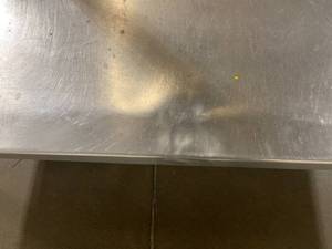 Two-Tier Stainless-Steel Table with Backsplash