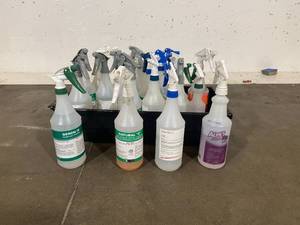 Bin of Cleaners, Sanitizers Spray Bottles