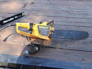lot 1255 image: Remington Power Cutter 16 Electric Chainsaw with Custom Attachment
