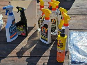 lot 1303 image: Lot of (9 Bottles) Car Care Products - Armor All ProtectantCleanerGlass CleanerArmor Plate, STP Citrus Cleaner, STP Son of a Gun Protectant