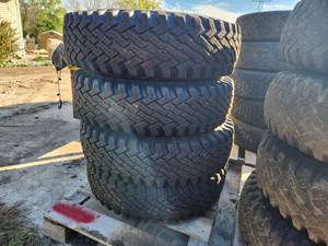 Lot of (4) Specialty Tires Of America Superlug 9.00-16LT Skid Loader Tires with 8-lug Rims